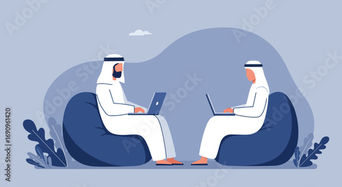 Two Arab men in traditional attire working remotely on laptops while comfortably seated on bean bag chairs, depicting modern business or education.