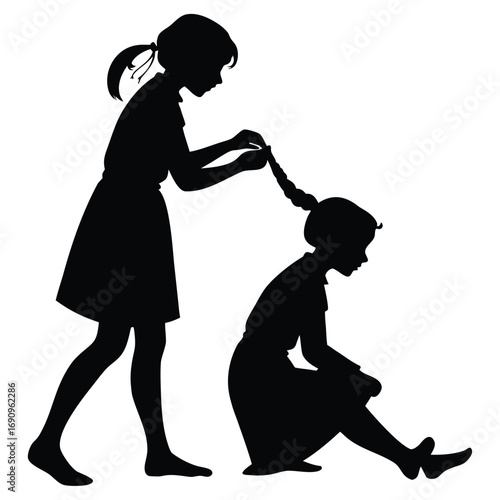 Girl braiding friend’s hair