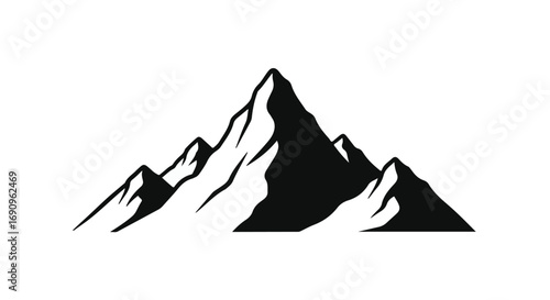 Majestic mountain peaks silhouetted against a clear sky, symbolizing adventure and achievement.