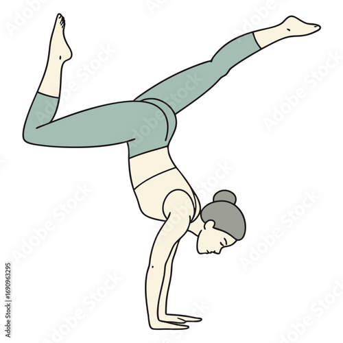 Woman in yoga crow pose balancing on hands with legs extended handstand balance