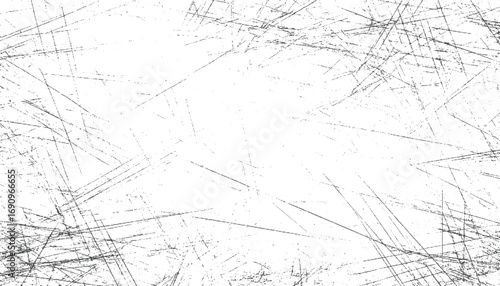 Black lines scattered on white surface abstract background