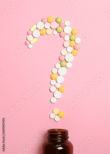 Wallpaper Mural pills on a colored background top view. Medicine, treatment, illness.. Vertical photo format Torontodigital.ca