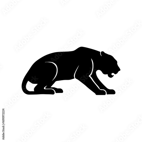 Silhouette of crouching big cat predator - Black silhouette illustration of a crouching big cat, symbolizing strength, hunting instinct, danger, and wildlife power in nature.
