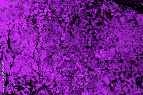 Pink-toned grunge texture with distressed and worn-out patterns, perfect for backgrounds or artistic concepts, lending an abstract and vibrant appeal to your visual creations.