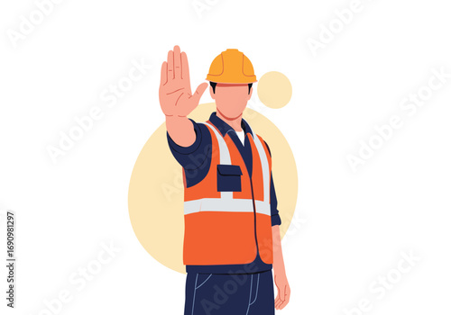 Construction worker in safety vest and hard hat showing stop hand gesture