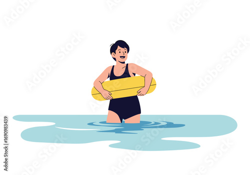 Man with big yellow inflatable tube standing in water wearing a black swimsuit