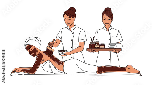 Two skilled spa therapists providing a relaxing body treatment and massage to a client lying on a spa bed with a towel