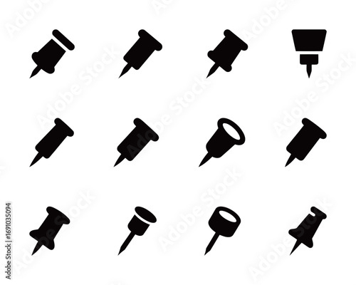 Set of black solid vector icons representing different thumbtacks and pushpins from various angles on a white background.