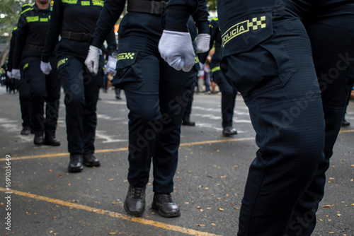 Police unit marching on the street, Colombian police parade, Armed forces demonstration of discipline. High quality photo