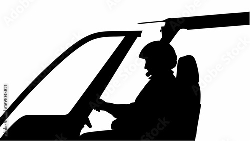 Silhouette of a pilot in a helicopter cockpit wearing a helmet and operating the controls in black and white