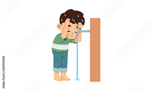 A young Muslim boy performs Wudu, the Islamic ritual of ablution, by washing his face with water from an outdoor tap.