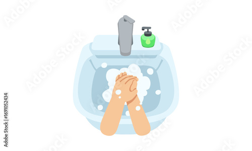 A top-down view of a person washing their hands with soap and water in a sink, creating a lot of foam.