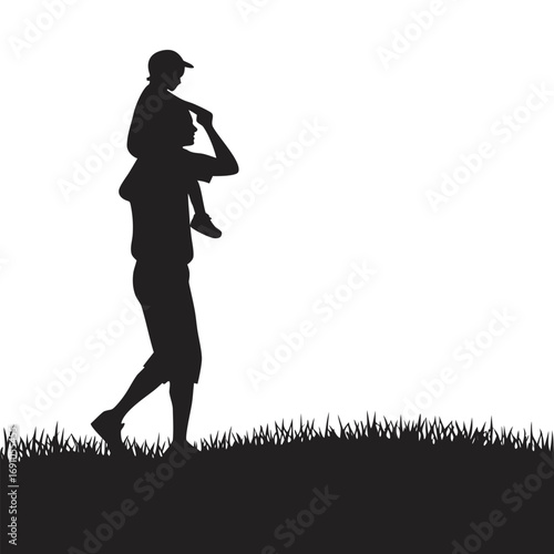Father carrying child on shoulders