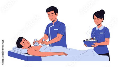 Two medical professionals in blue uniforms are attending to a male patient lying on a medical bed receiving treatment