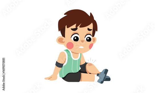 A young boy with a worried expression sits on the ground, holding his injured knee.