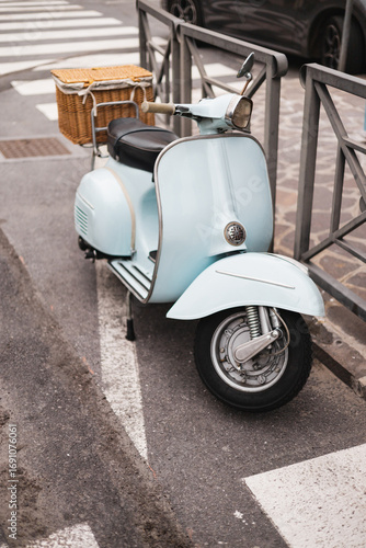Classic blue scooter on the street - vintage transport