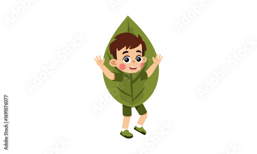 A boy dressed in a large green leaf costume, smiling and with arms raised.