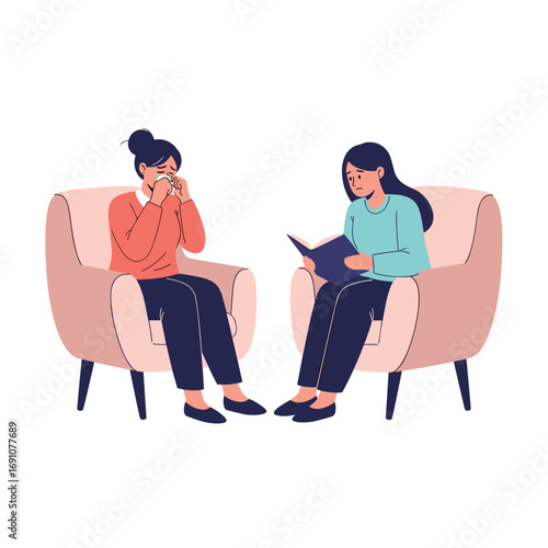 Two women sitting in chairs discussing mental health and well being during a therapy session