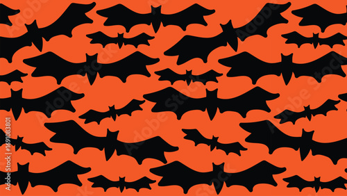 Black bat silhouettes on an orange background, perfect for Halloween themes.
