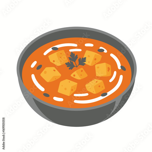 Bowl of paneer butter masala sitting on a white surface, garnished with cilantro, showcasing indian cuisine and culinary delight.