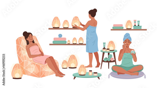 Aesthetician applying a facial mask to a relaxed woman in a spa setting with a male attendant holding a tray of beauty products