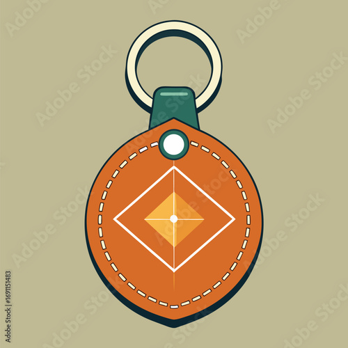 Modern leather keychain with geometric design in orange and white on a beige background with a metal ring for a fashion accessory