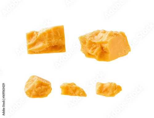 cheddar cheese cubes isolated on a white background.