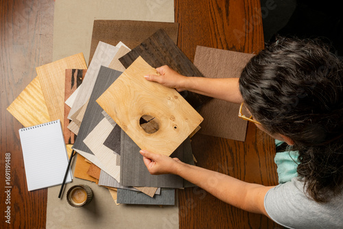 Designer Choosing Wood Samples with Coffee