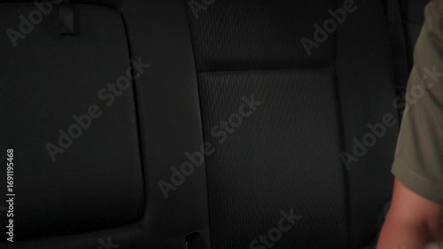 Close-up of the back of a car seat, with carefully arranged textures and designs.