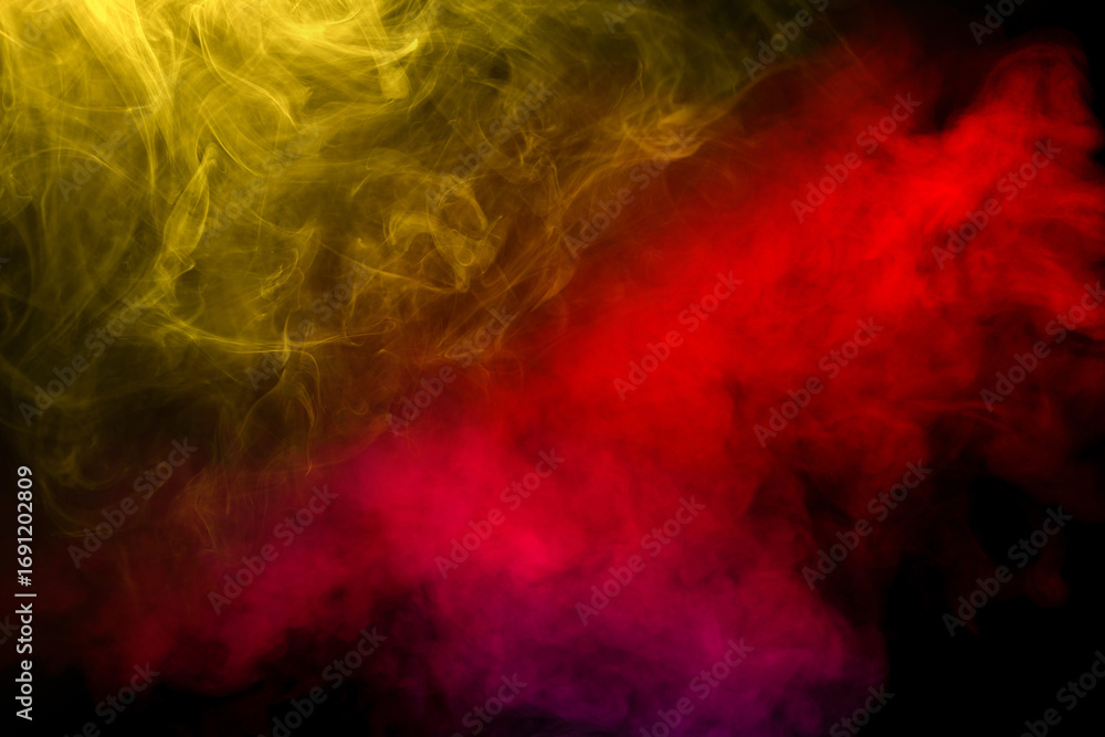Obraz premium Yellow and pink steam on a black background.