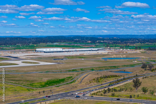 Tableau sur toile Drone aerial photograph of the Logistics Precinct located near the new Western Sydney International Airport in the Greater Western Sydney suburb of Badgerys Creek in New South Wales, Australia
