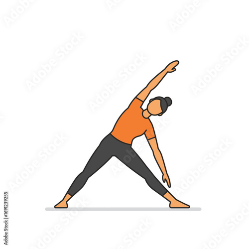 Woman performing triangle pose during yoga class, stretching her body and focusing on balance for a peaceful and mindful practice.