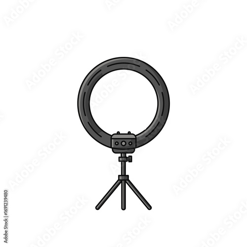 Ring light stands ready on its tripod, promising even illumination for photography or video recording in a studio setting, creating a professional atmosphere.