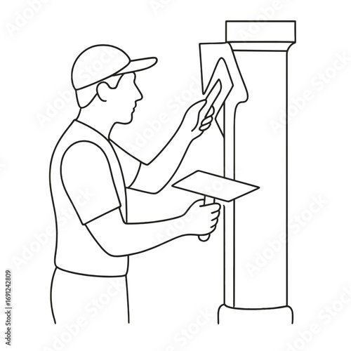 Man applying plaster to column with trowel in construction site  
