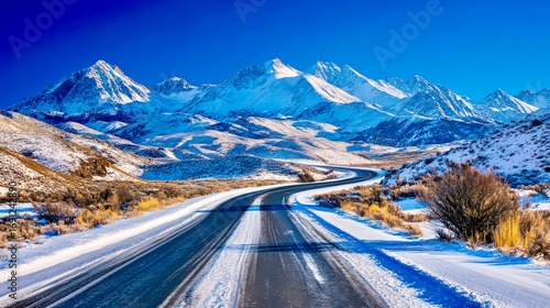 Winding road snowy mountains scenic winter alpine travel tourism landscape
