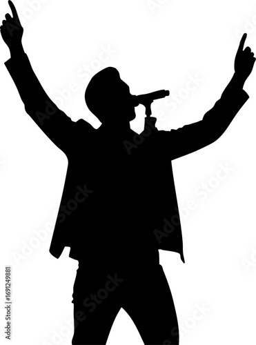 Dynamic performer raising hands in triumph, captivating audience with powerful vocal delivery