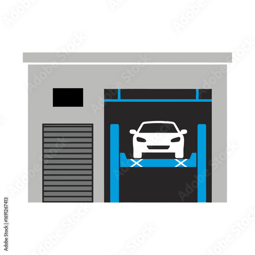 Car inside a garage on a hydraulic lift.