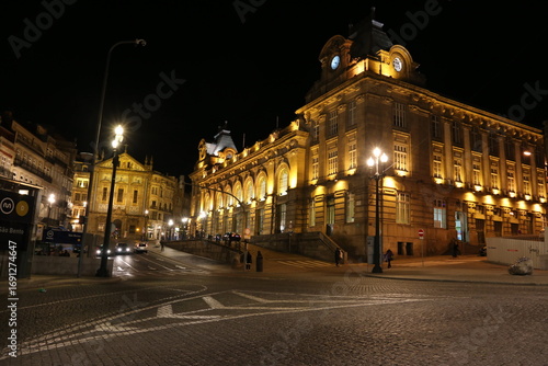 Illuminated Historic City Square at Night in Porto, Portugal