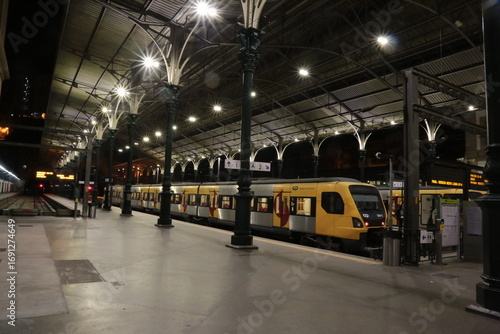 Illuminated Train Platforms in Porto at Night