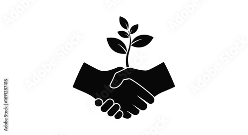 Hands shaking over a growing plant, symbolizing partnership and environmental growth.