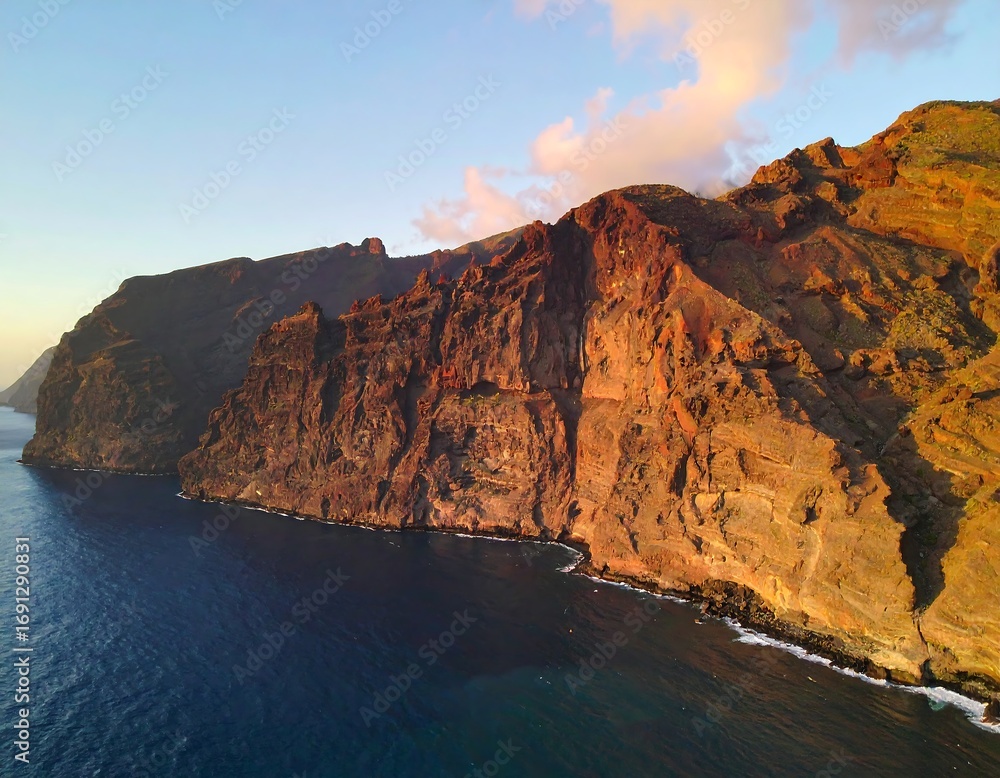 Fototapeta premium Dramatic coastal cliffs at sunset (1)