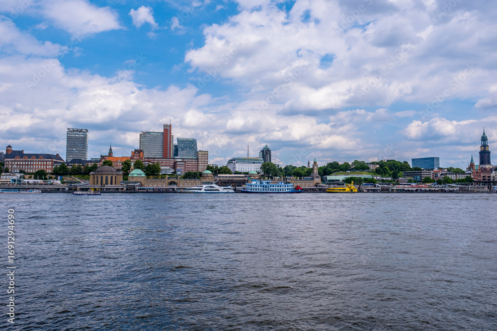 Fototapeta premium Hamburg Skyline with Landungsbrücken and St. Michael’s Church, Germany