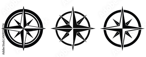 Three stylized black compass rose emblems with star points arranged in a horizontal line on a white background