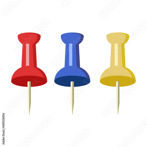 Three colorful pushpins in red, blue, and yellow isolated on a white background