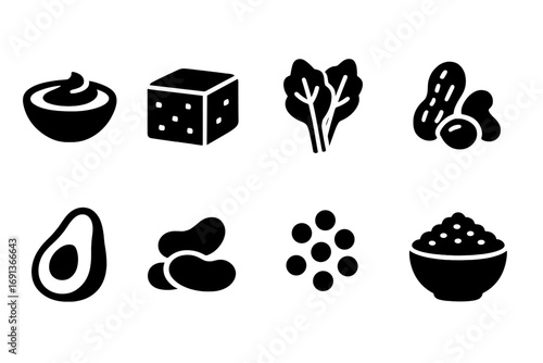 Vegan Food Icons. Solid, filled icon set of vegan foods: hummus, tofu block, leafy greens, nuts, avocado, beans, lentils, quinoa