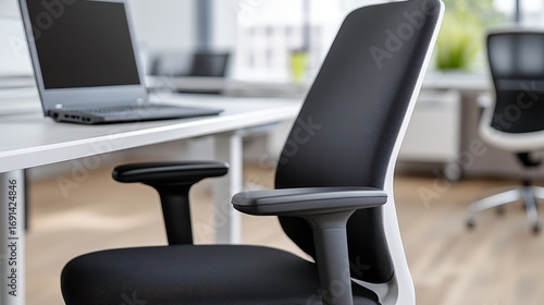 Modern Ergonomic Office Chair with Laptop on Minimalist Desk