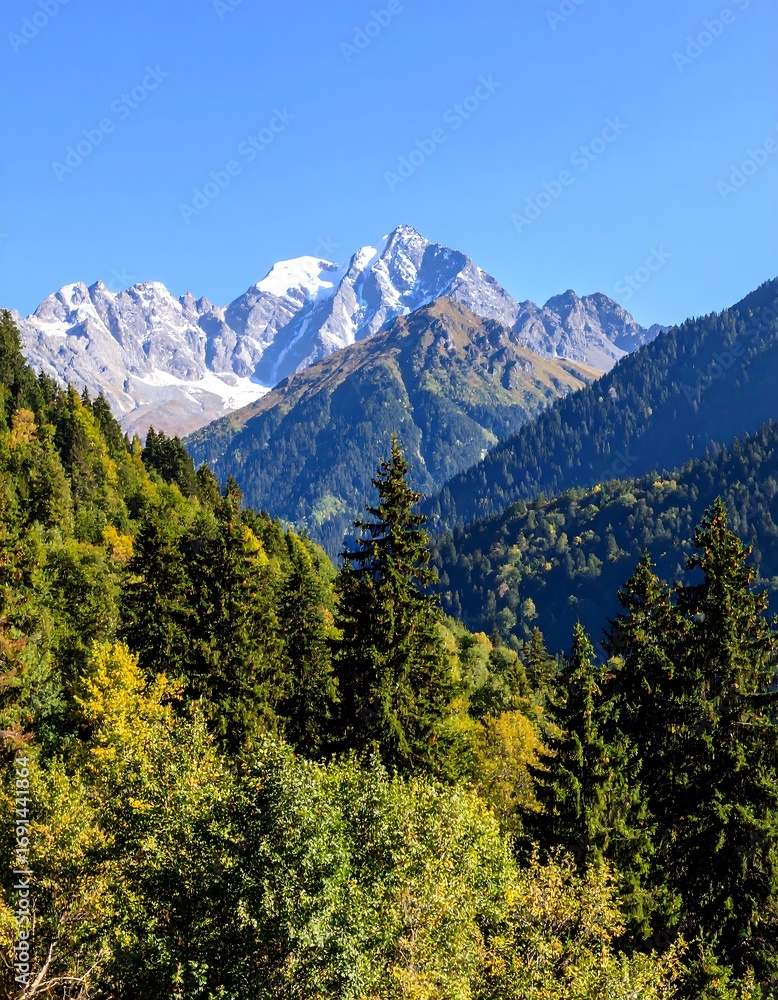 Fototapeta premium Alpine scenery with snow-capped peaks
