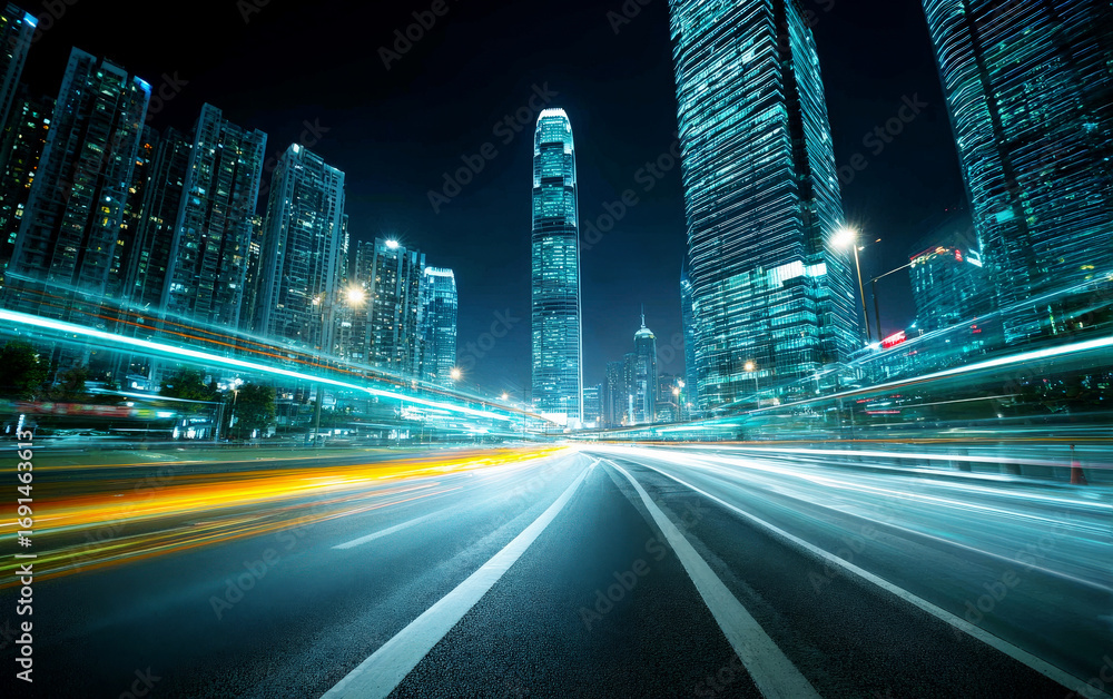 Naklejka premium Blurred light trails on city road at night with tall buildings