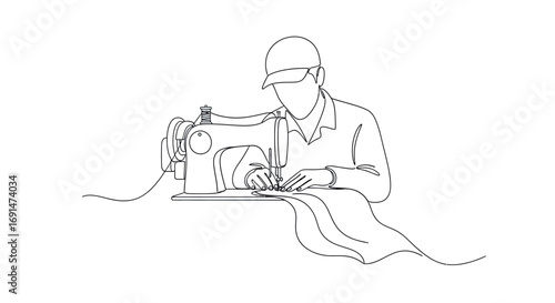 Person wearing a cap sewing fabric on a sewing machine