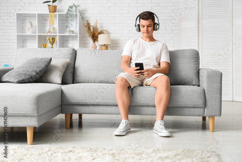 Teenage boy with headphones...